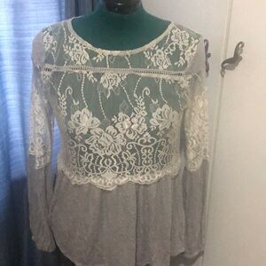 Lacey Gray and cream white blouse